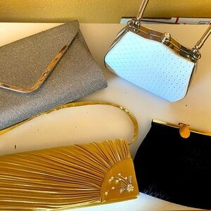 4 evening bags, silver, white, gold, blue.